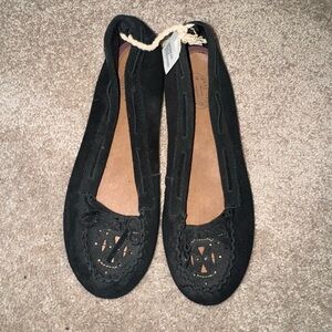 Black slip-on suede shoes